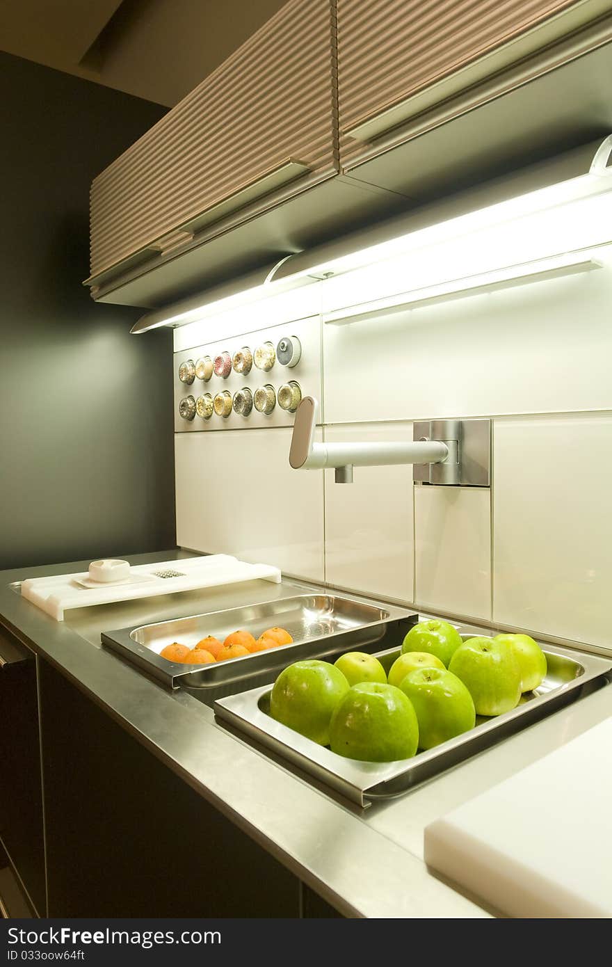 Part of kitchen with fruits