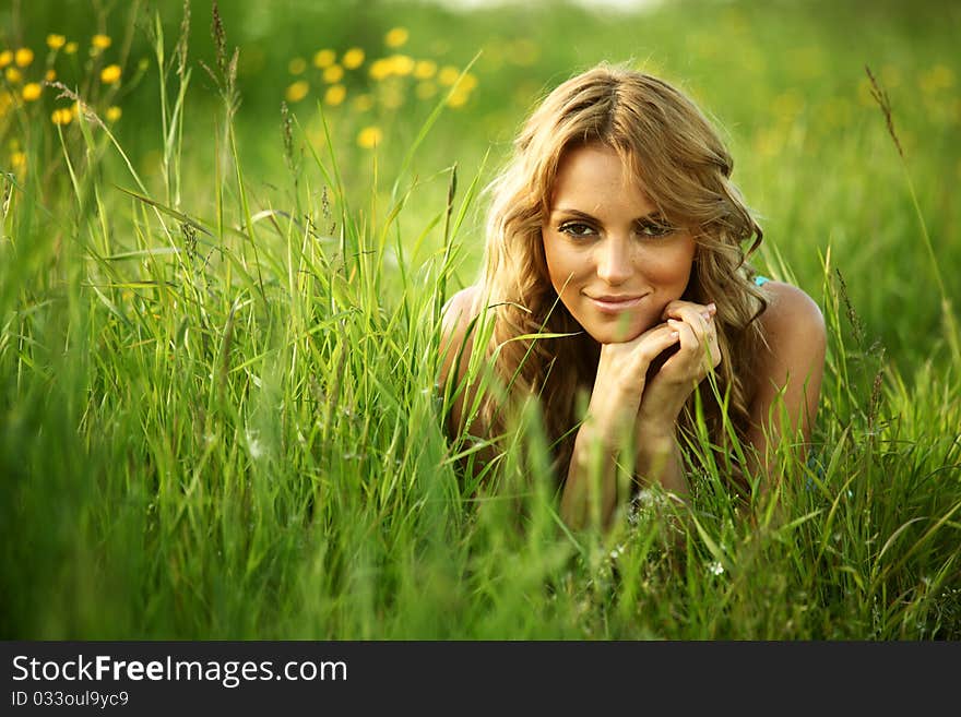 Blonde on grass