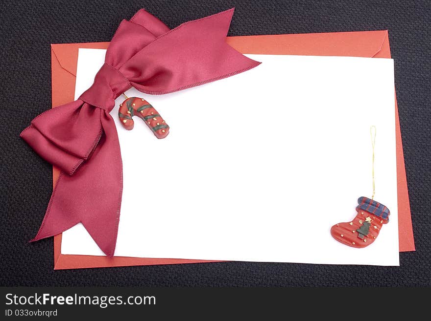 Congratulatory letter with a red envelope and a scarlet ribbon.