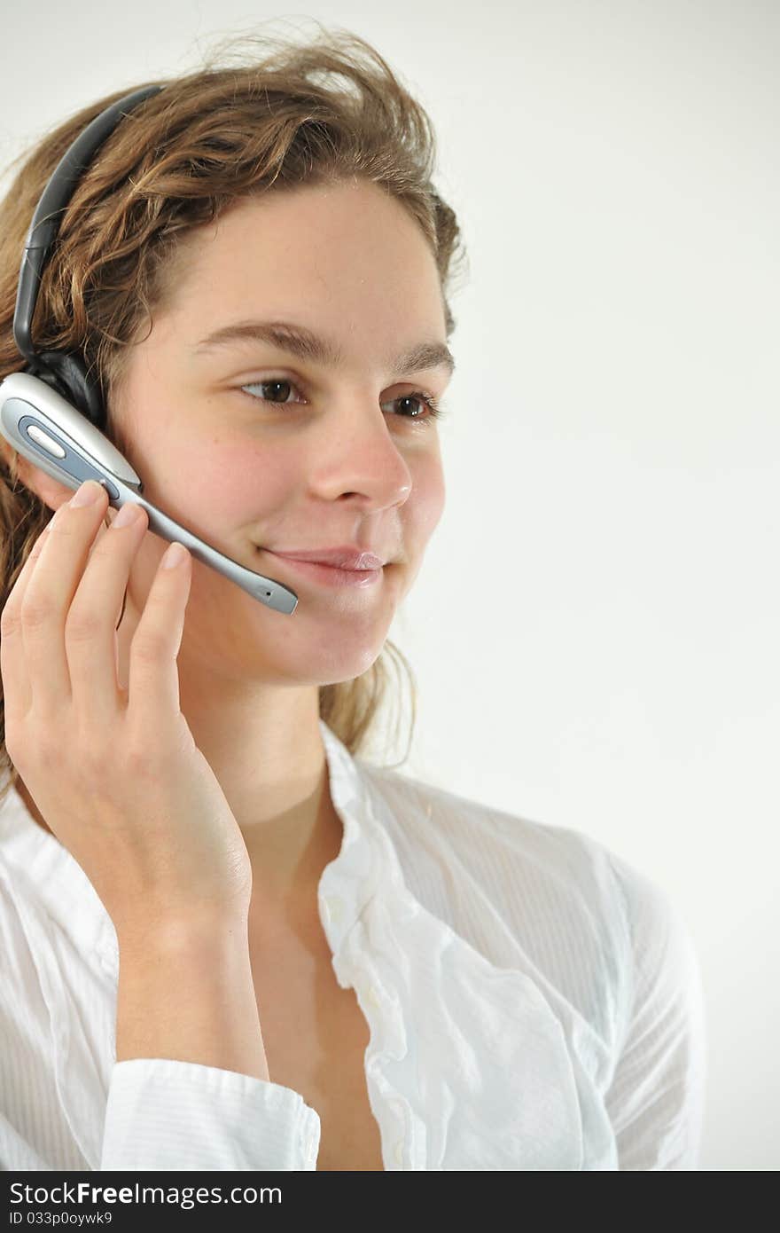 Female attractive young woman from call center with headset. Female attractive young woman from call center with headset