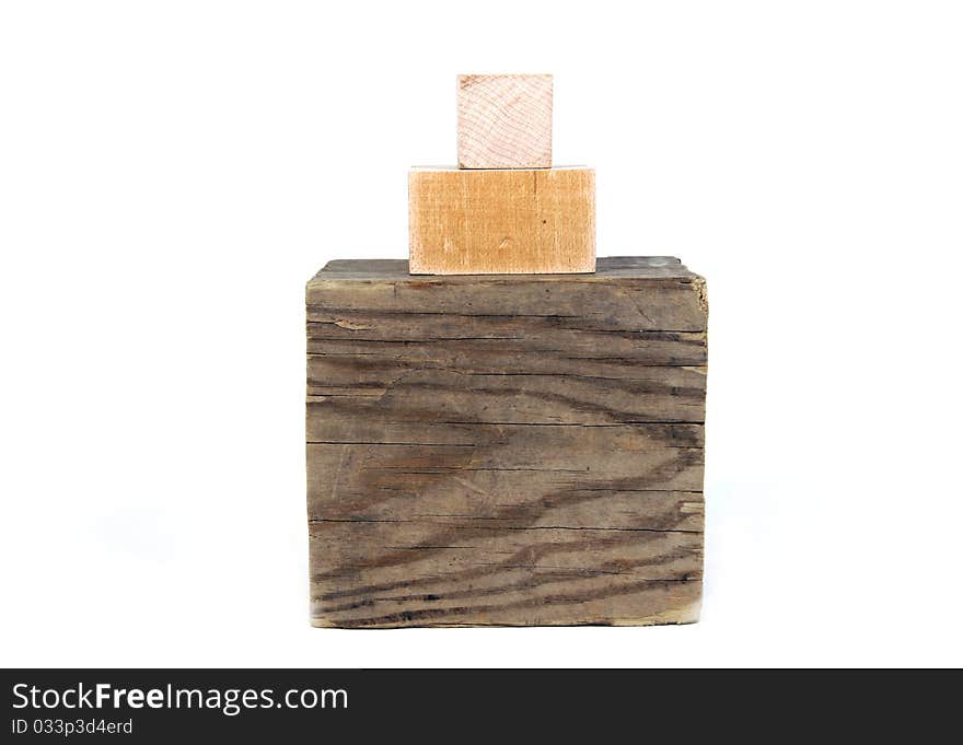 Stack of different sizes of wood blocks on white background. Stack of different sizes of wood blocks on white background