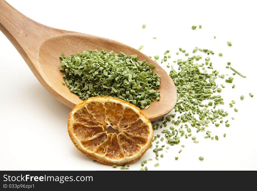 Cut chives and onto wooden spoons with lemon. Cut chives and onto wooden spoons with lemon