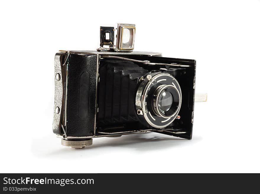 Old film photo camera on white background, isolated