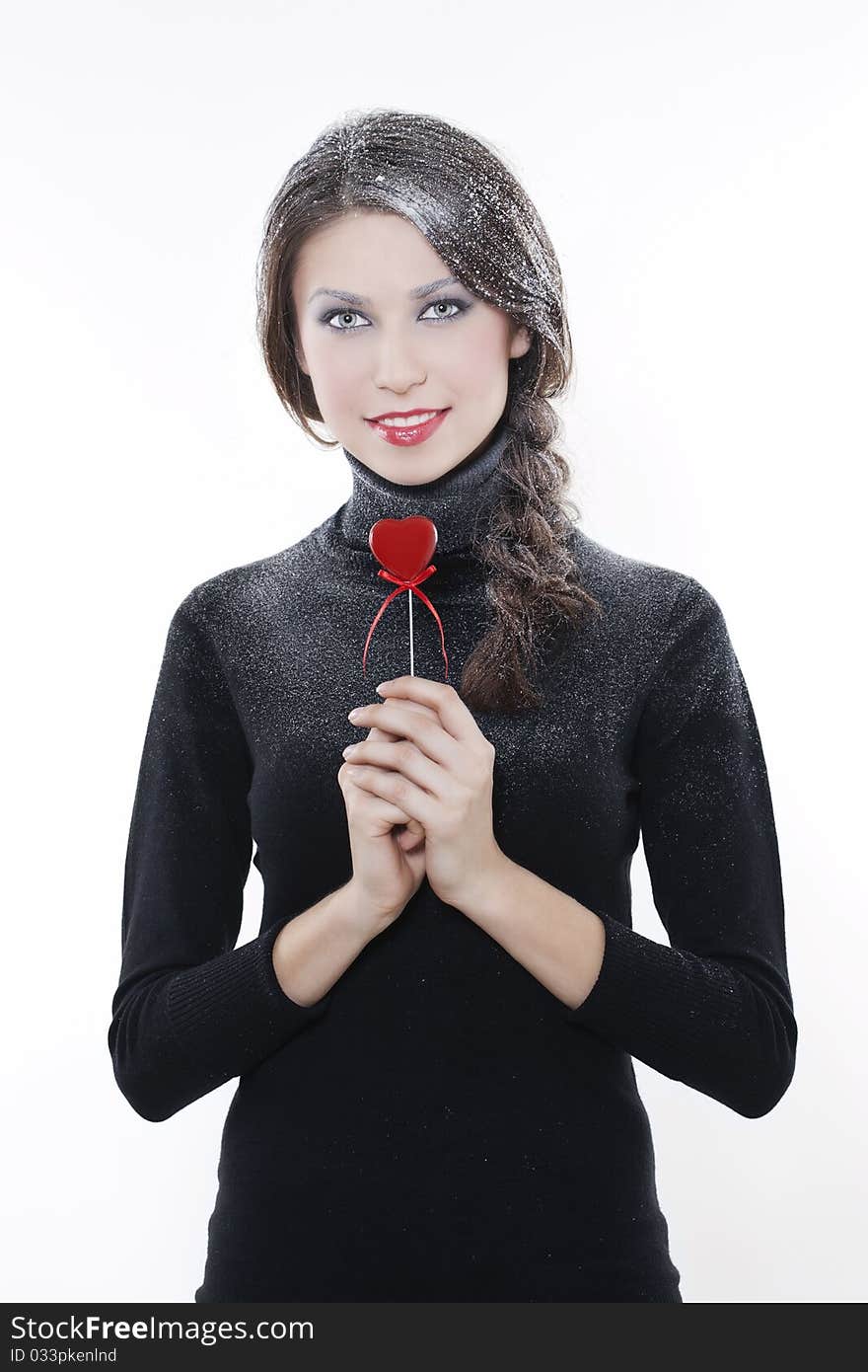 Beautiful smiling woman with heart on white background