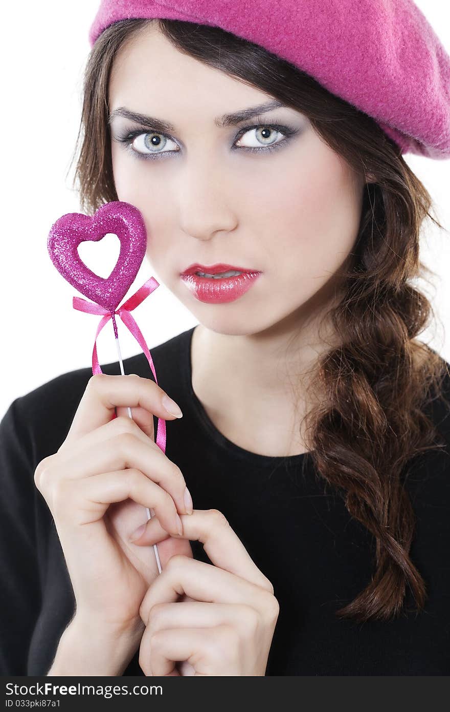 Beautiful smiling woman with heart on white background