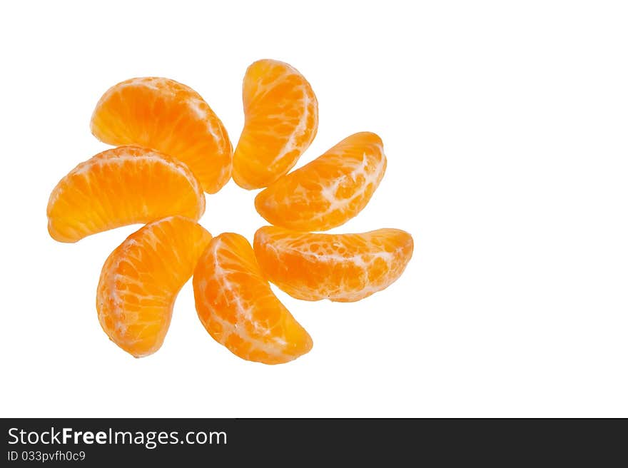 Mandarin citrus fruit segments isolated over white background. Mandarin citrus fruit segments isolated over white background.