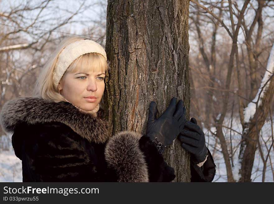 The Girl Near A Tree