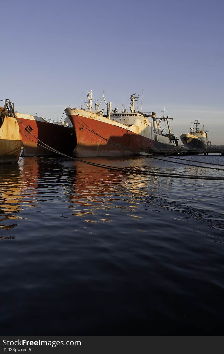 Horizontal shot of a shipyard at sunset