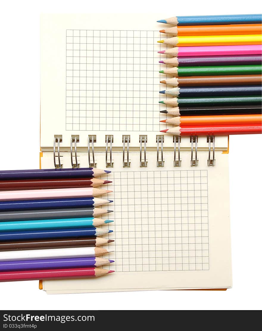 Blank notebook and color pencils