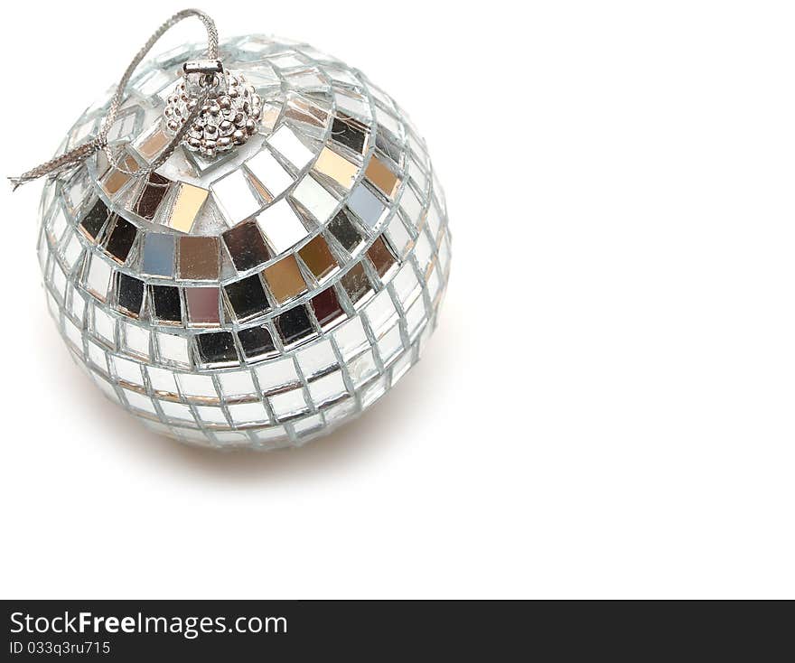 Closeup of a mirrorball on a white background