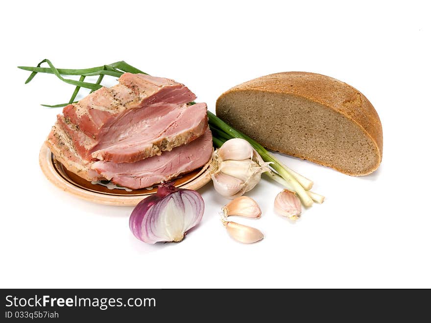 Lard and bread on white background