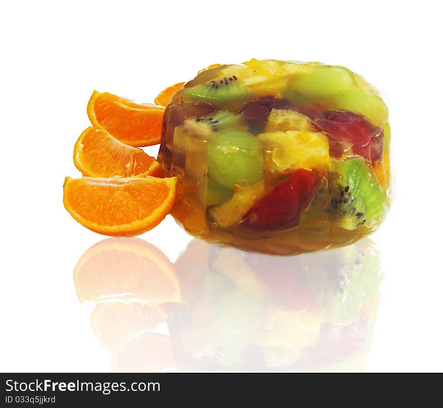 Fruit salad with oranges isolated on white background.