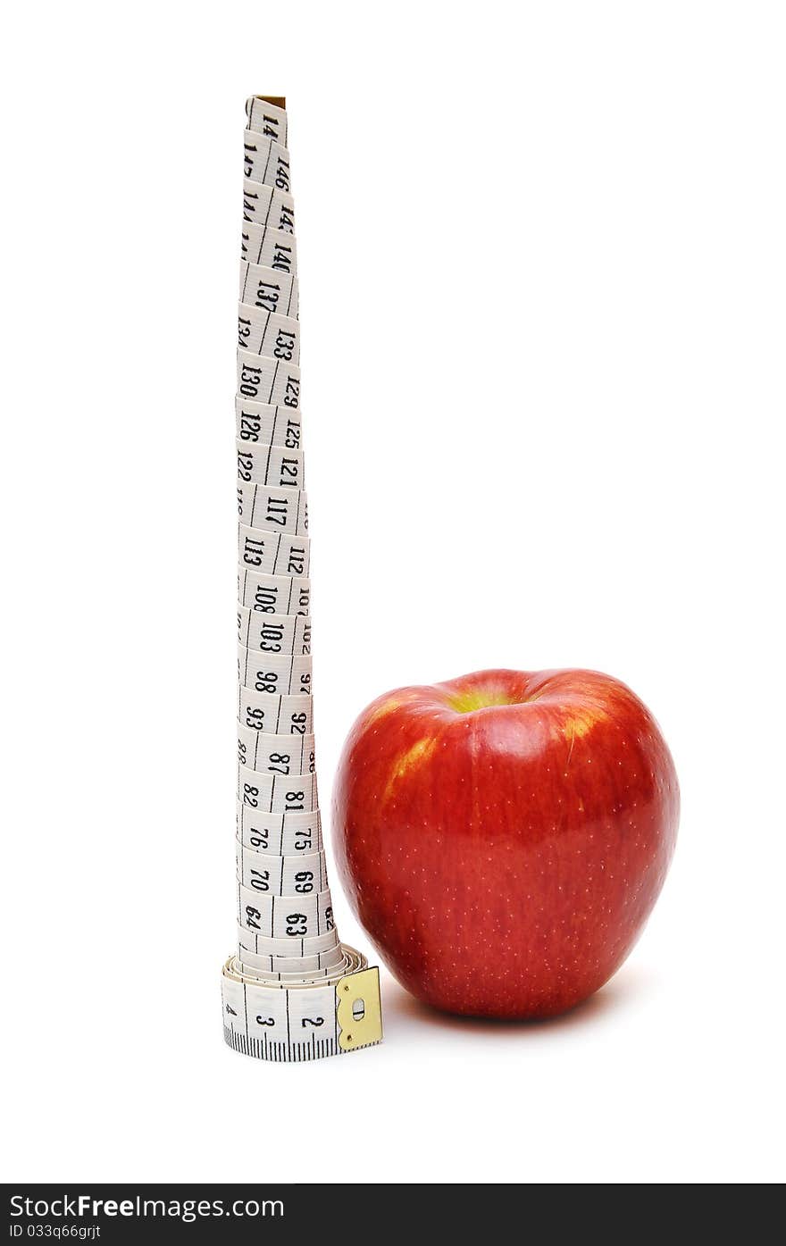 Red apple and tape measure