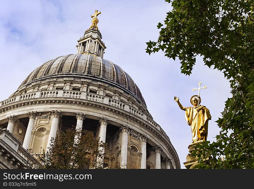 Dome of St Paul`s Cathedral and St Paul statue in London. Dome of St Paul`s Cathedral and St Paul statue in London