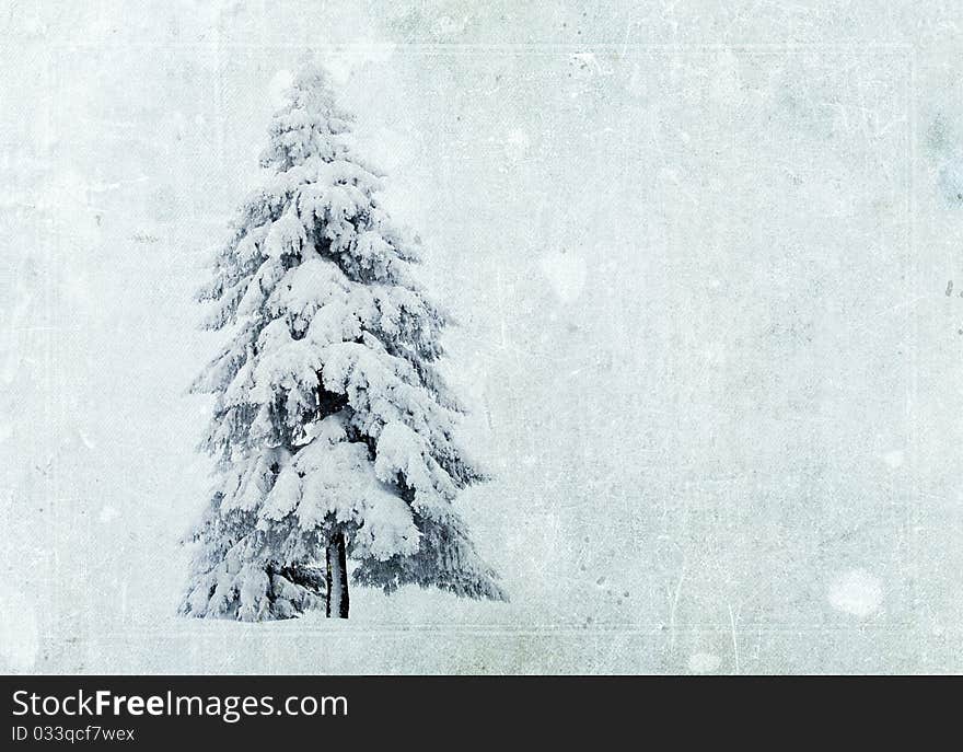 Vintage christmas greeting card with snowy firs