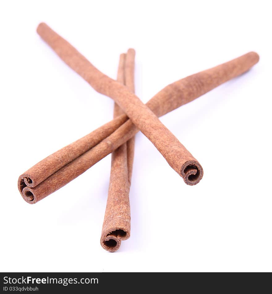 Cinnamon sticks on white background