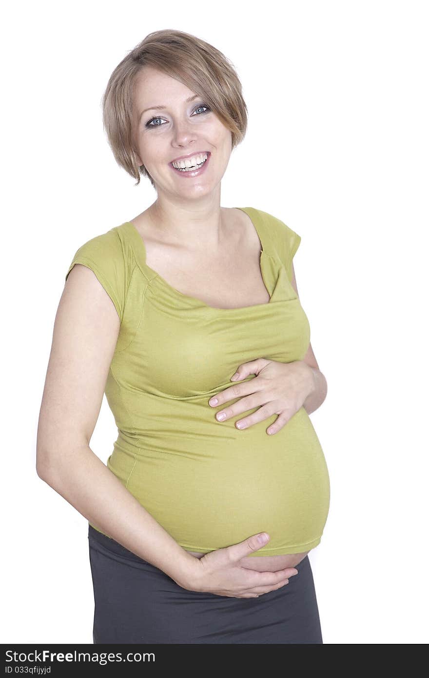 Pregnant pretty woman in studio over white background. Pregnant pretty woman in studio over white background