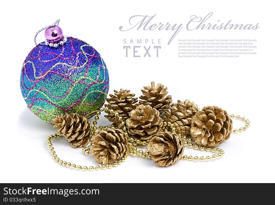 Isolated shiny pink Christmas ball and gold Spruce branches with copy space. Isolated shiny pink Christmas ball and gold Spruce branches with copy space