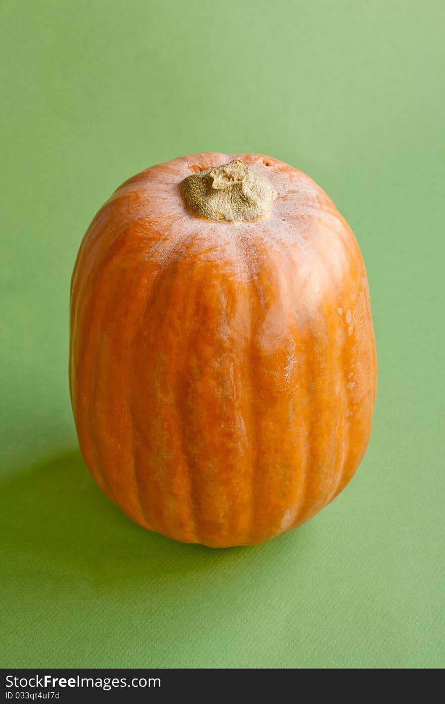 Pumpkin in isolated on green background