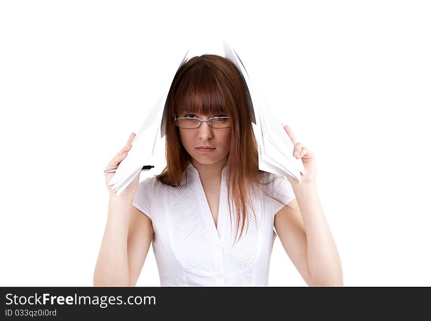 The girl has covered a head with documents. The girl has covered a head with documents