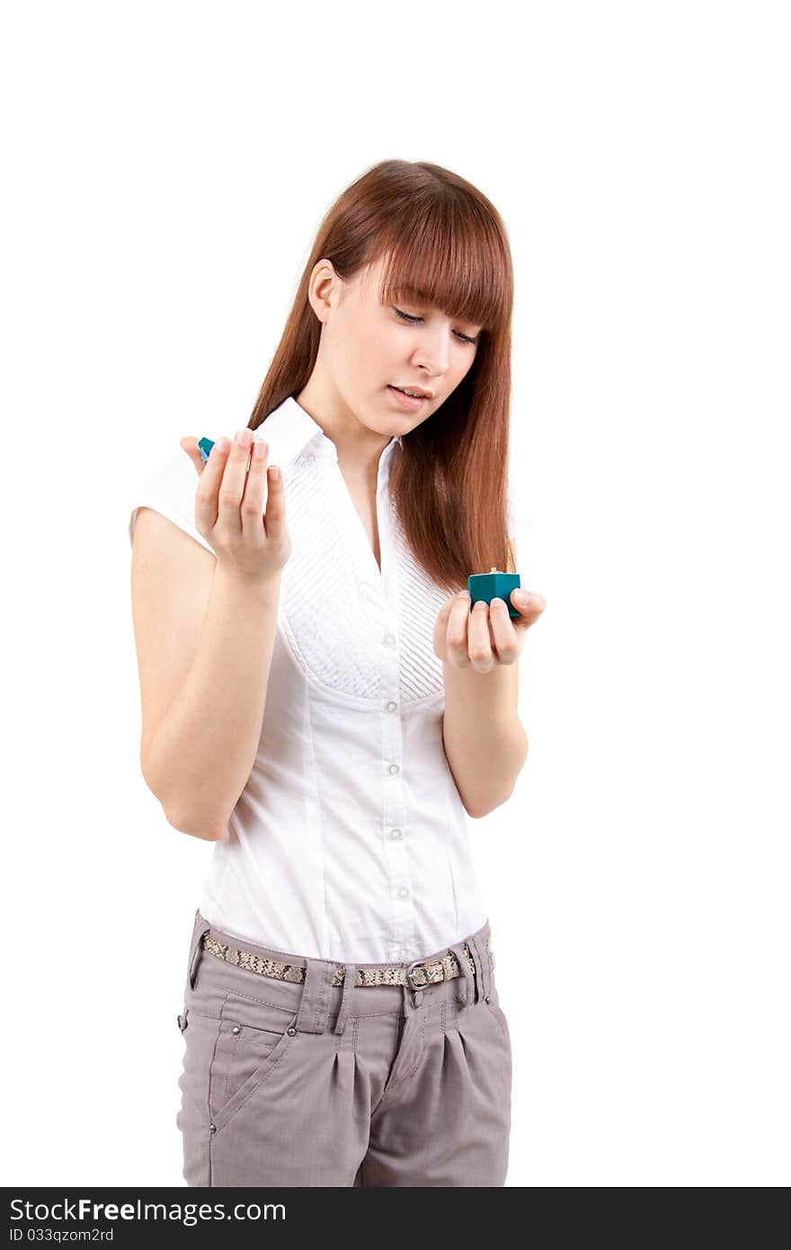 The beautiful girl with a gift in hands