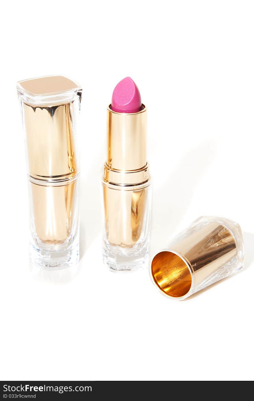 Women's lipstick in a transparent body with a white background