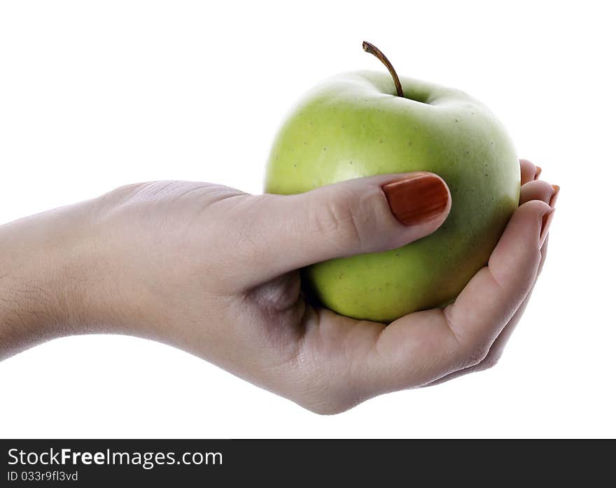 Green apple in a hand