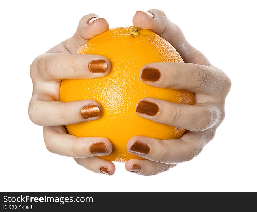 Two hands hold an orange, is isolated on the white. Two hands hold an orange, is isolated on the white