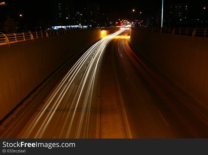 Blurred Motion of Car Lights on Highway at Night. Blurred Motion of Car Lights on Highway at Night