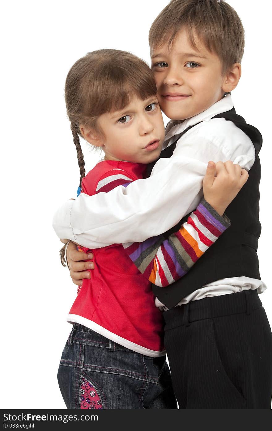 Brother and sister hug each other. Brother and sister hug each other