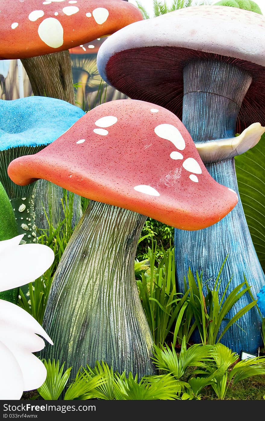 A garden with fake mushrooms