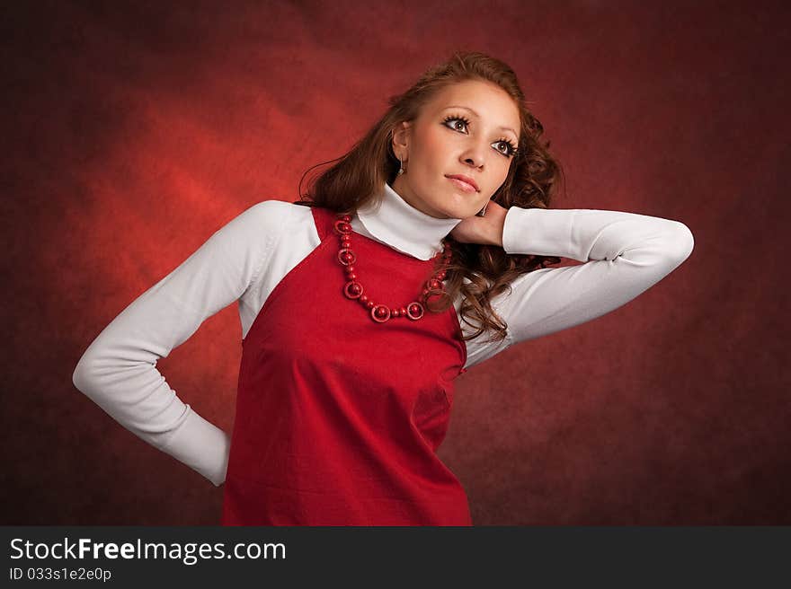 Portrait of woman in a red dress. Portrait of woman in a red dress