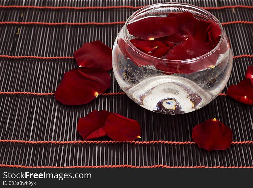 Rose petals and bowl of water