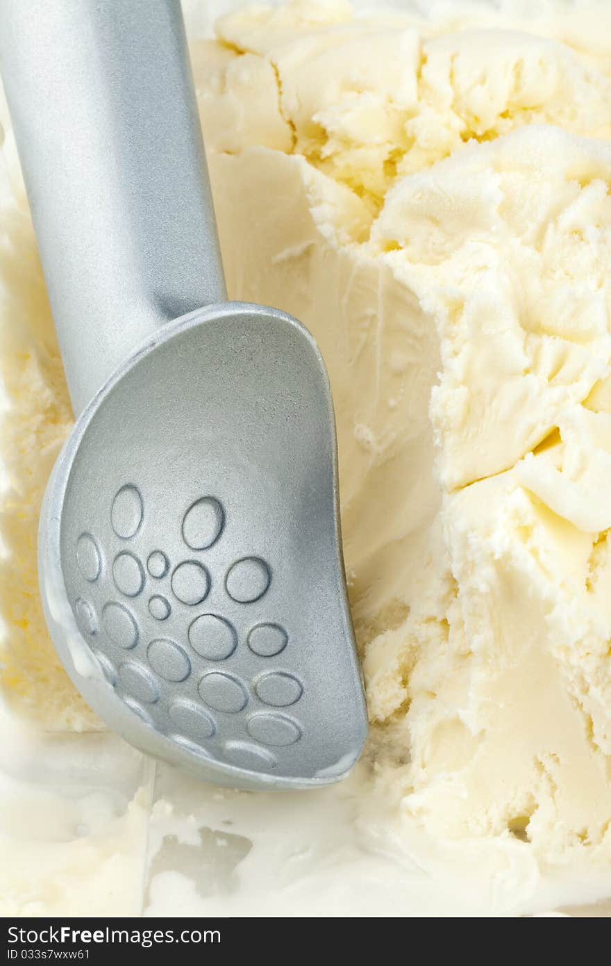 Delicious vanilla ice cream with a spoon