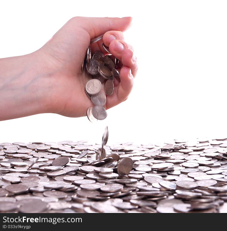 Woman's hands holding a handful of coins. Woman's hands holding a handful of coins