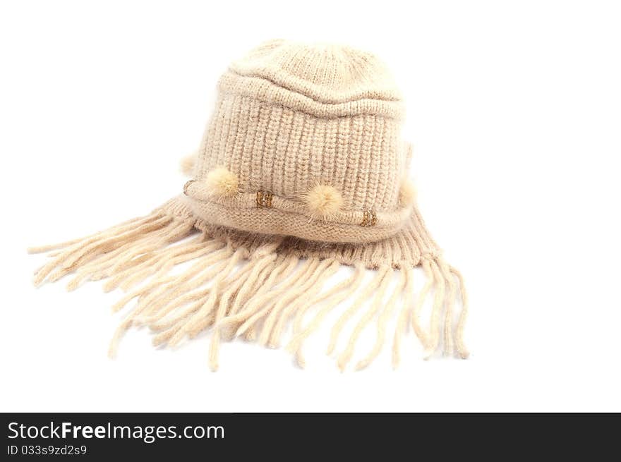 Warm knitted cap with a scarf