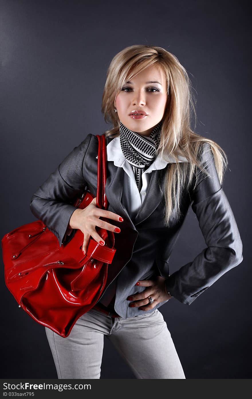 Fashion young woman with red bag