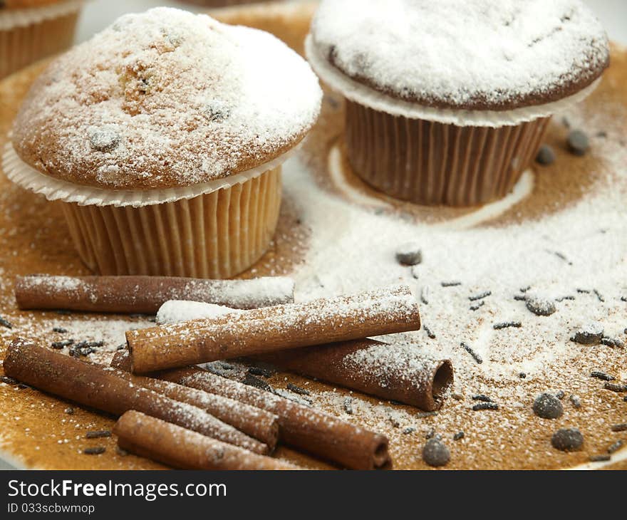 Fresh baked muffins over the cinnamon