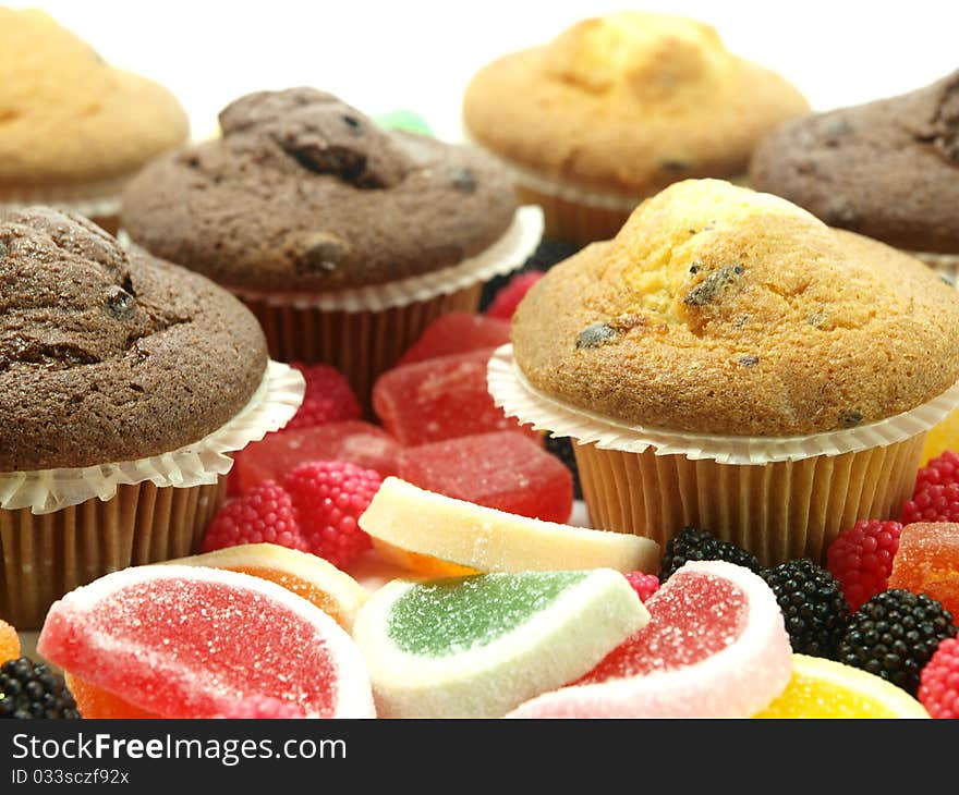 Fresh baked muffins and sugar candies