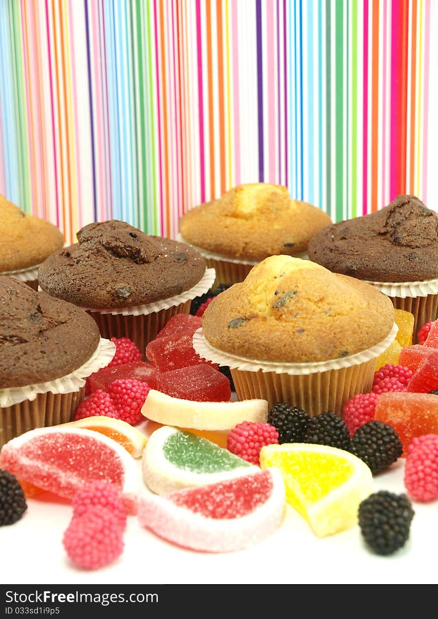 Fresh baked muffins and sugar candies