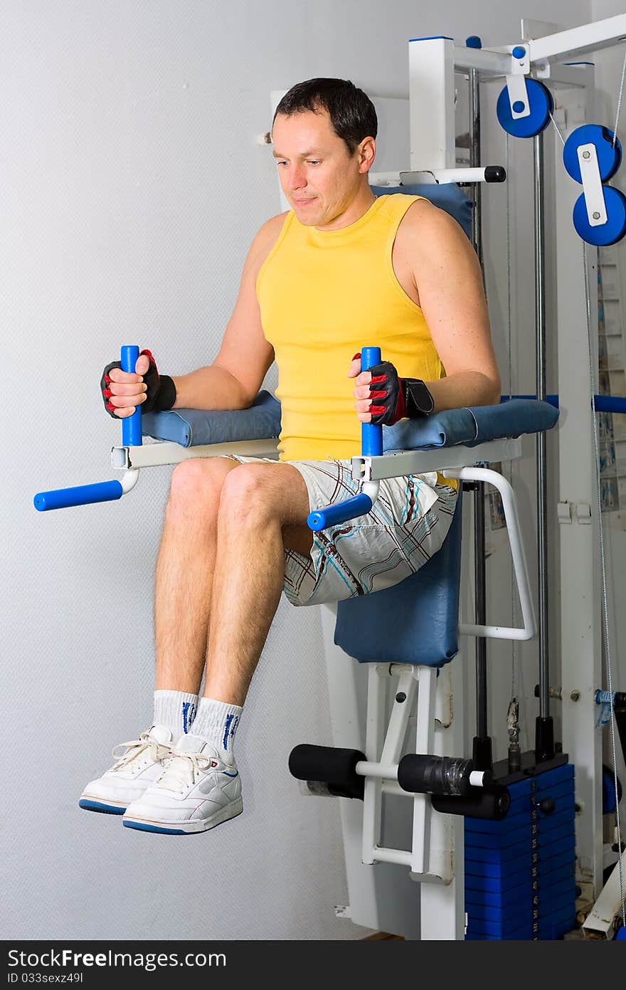 Man training in fitness center