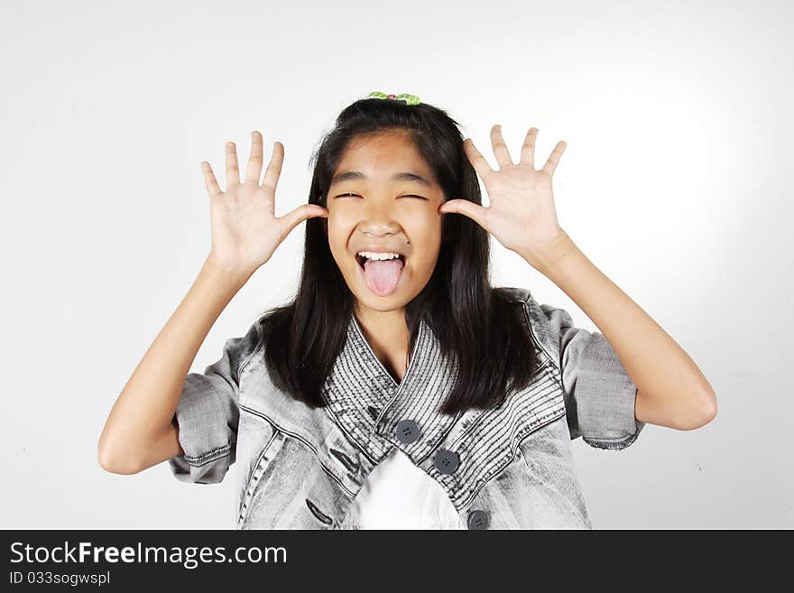 Girl with funny face fooling around.