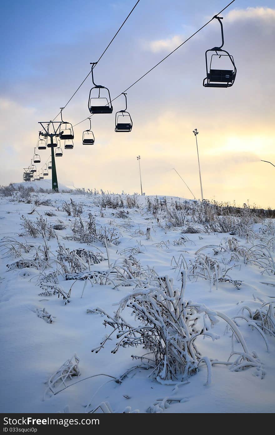 Ski Lift Line And Working Snowguns