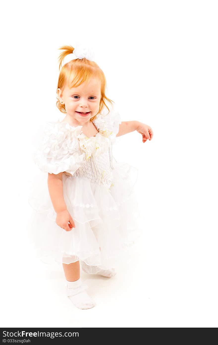 Beautiful little girl on a white background