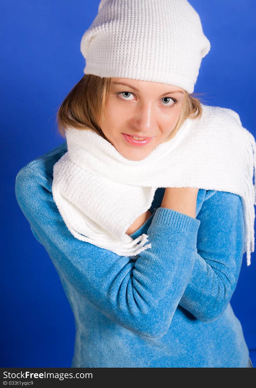 Young  woman on a blue background