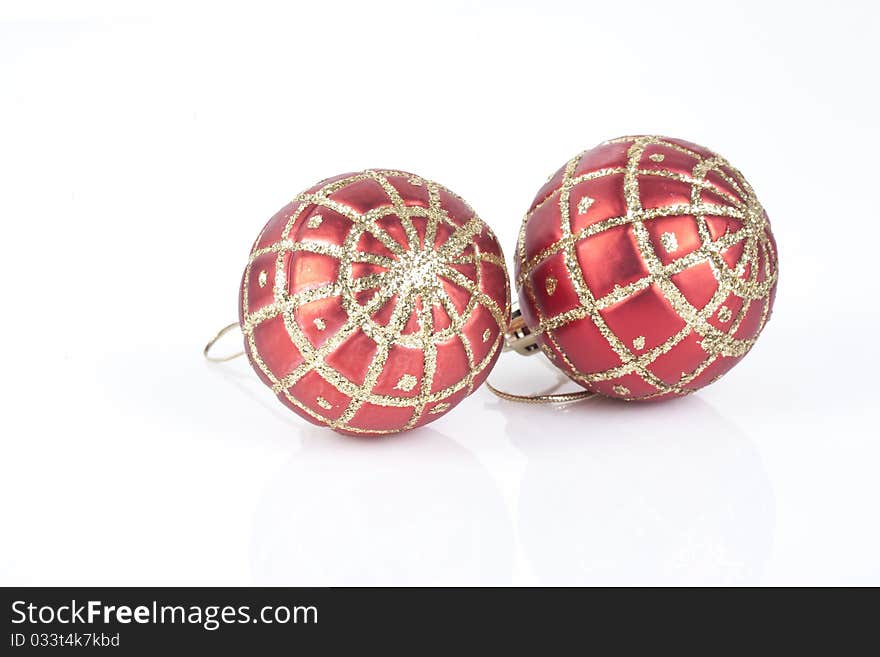 Two red Christmas baubles