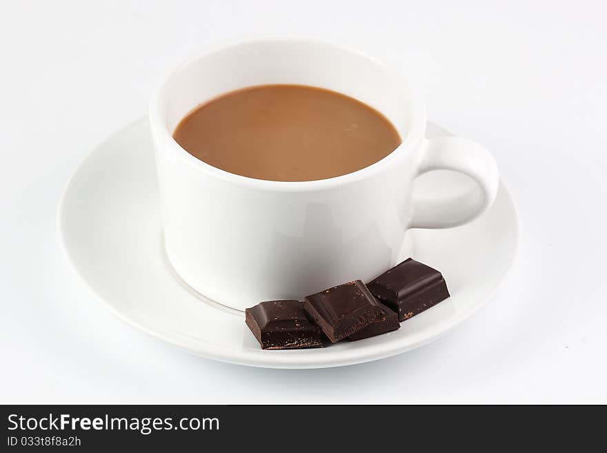 White coffee mug with chocolate bars