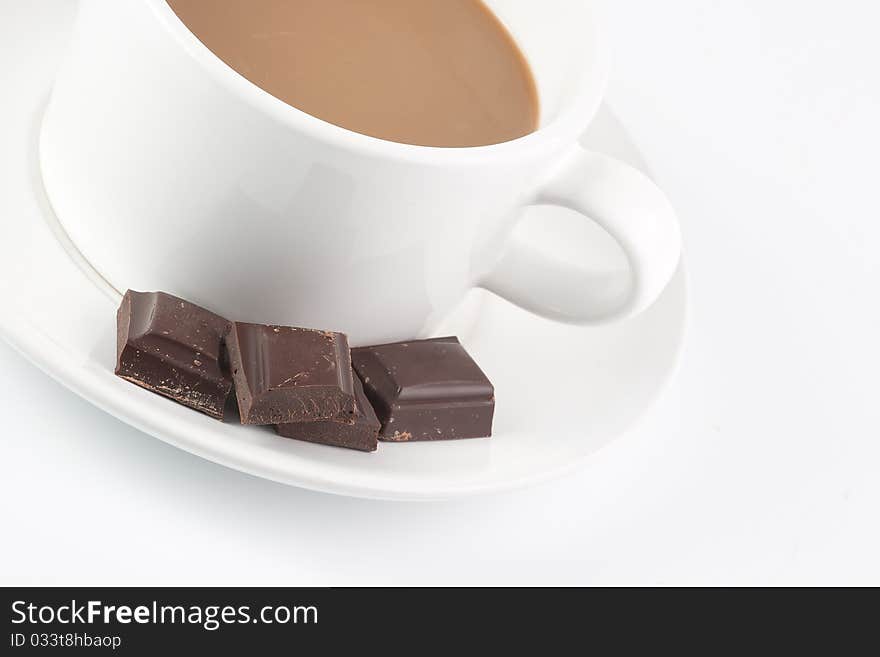 White coffee mug with chocolate bars