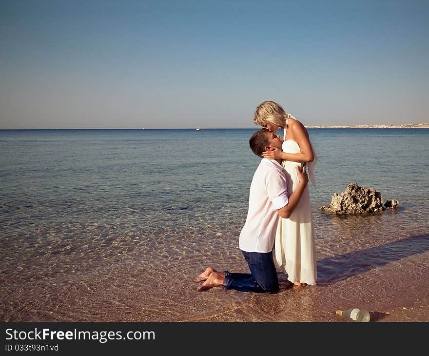 Couple kissed on beach happiness, smile. Couple kissed on beach happiness, smile