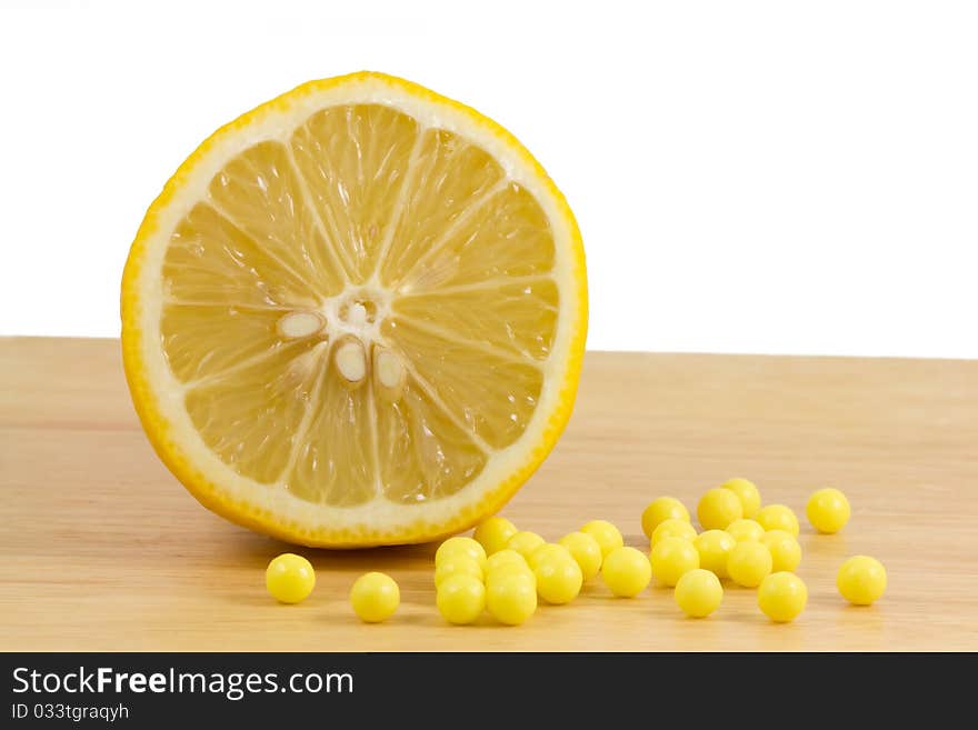 Lemon and ascorbic acid. Close up. Lemon and ascorbic acid. Close up